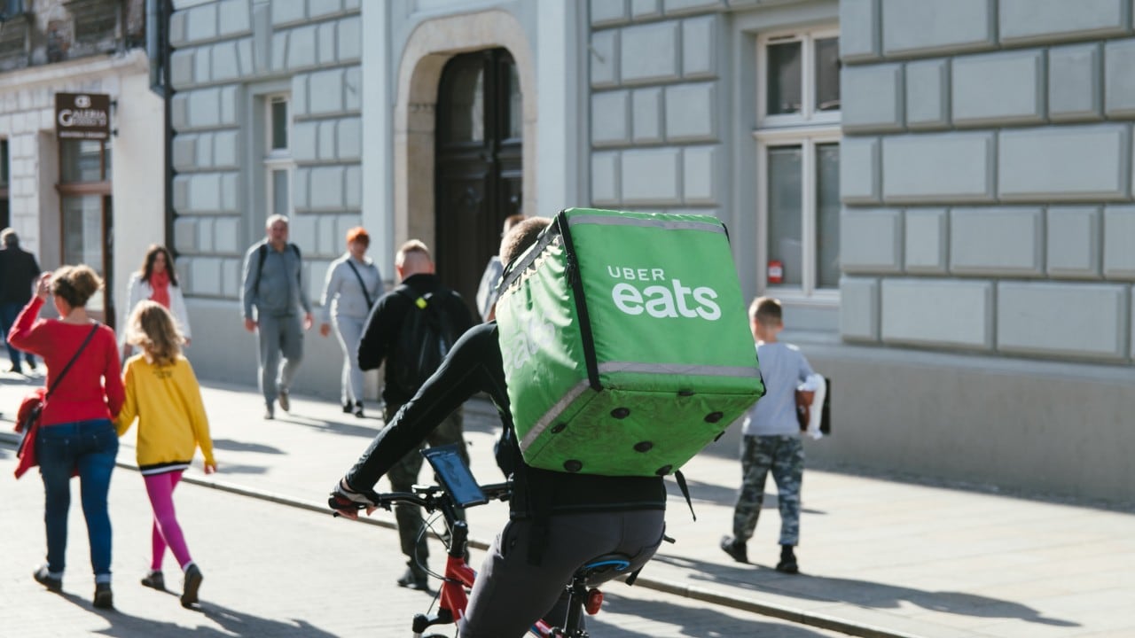 Uber Eats driver on a bike Uber Eats driver on a bike