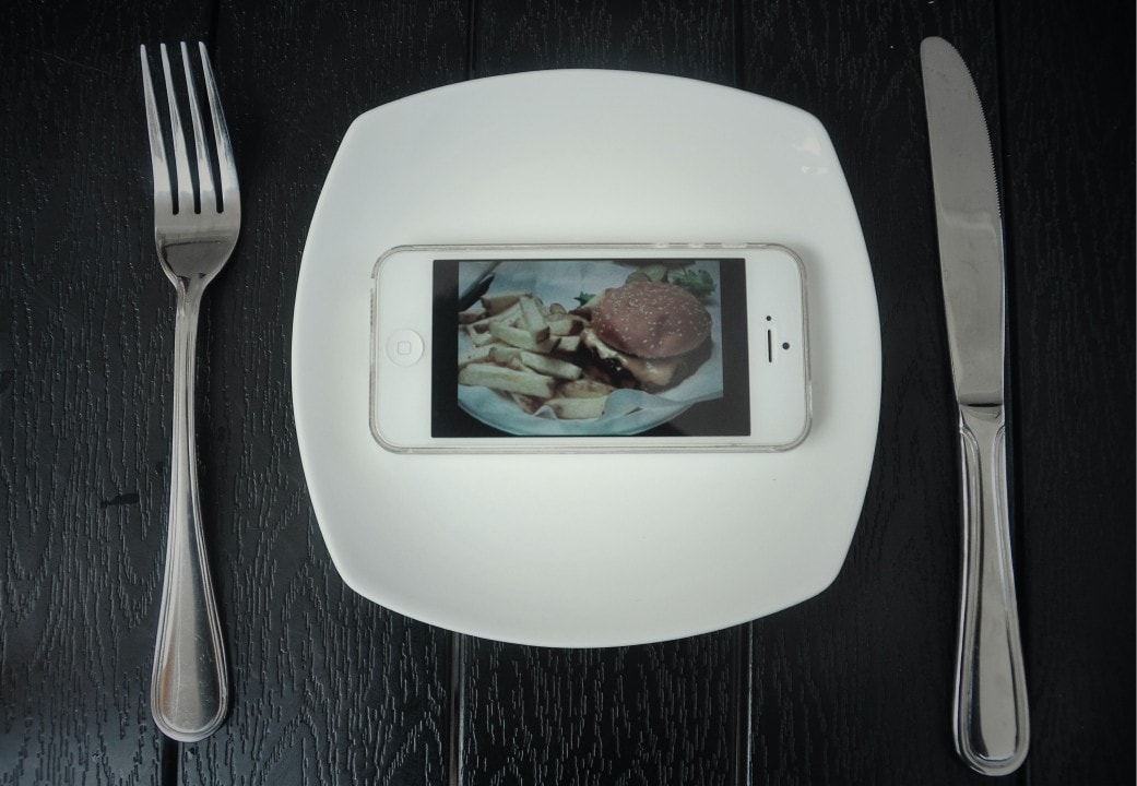 Plate with the phone and burger image Plate with the phone and burger image