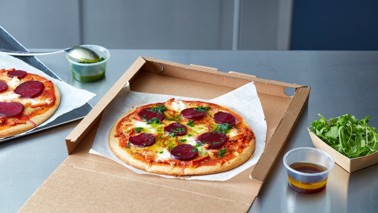 Freshly made pizza in a takeout box Freshly made pizza in a takeout box