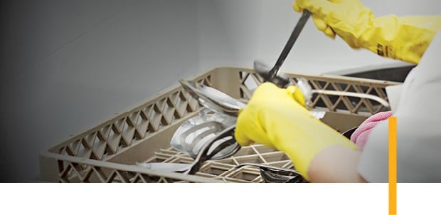 Kitchen utility being properly cleaned. Kitchen utility being properly cleaned.