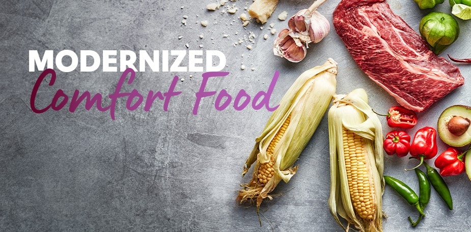 Traditional Mexican ingredients are laid on a stone counter. The text reads: Modernized Comfort Food.