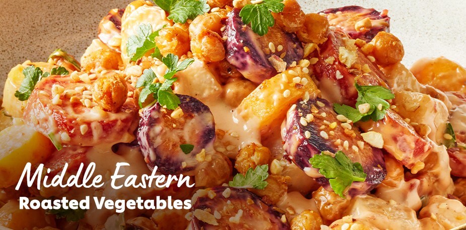 A professionally plated vegetable bowl is shown. The text reads: Middle Eastern Roasted Vegetables.