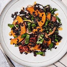 Roasted squash and black rice salad with umami vinaigrette.