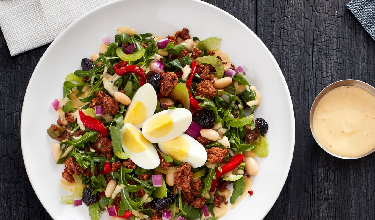 Chorizo, White Bean and Oil Cured Olive Chopped Salad with Smoky Honey Mustard Dressing