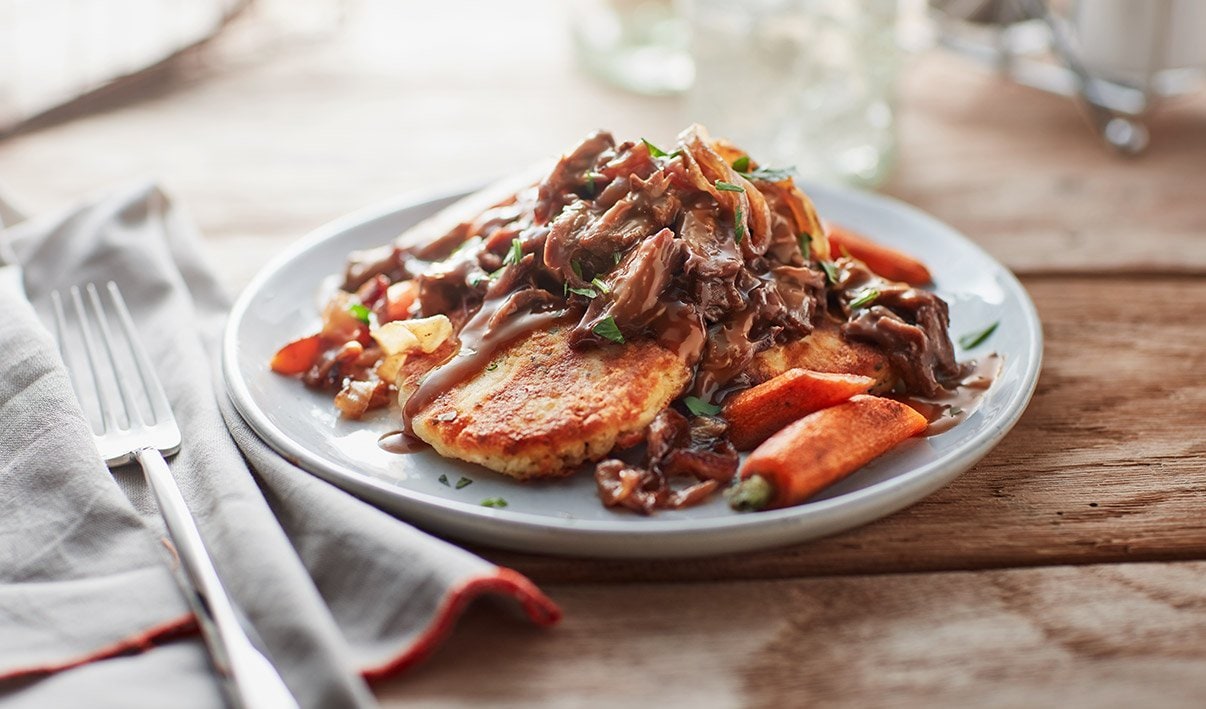 Braised Beef and Carrots on Potato Pancakes