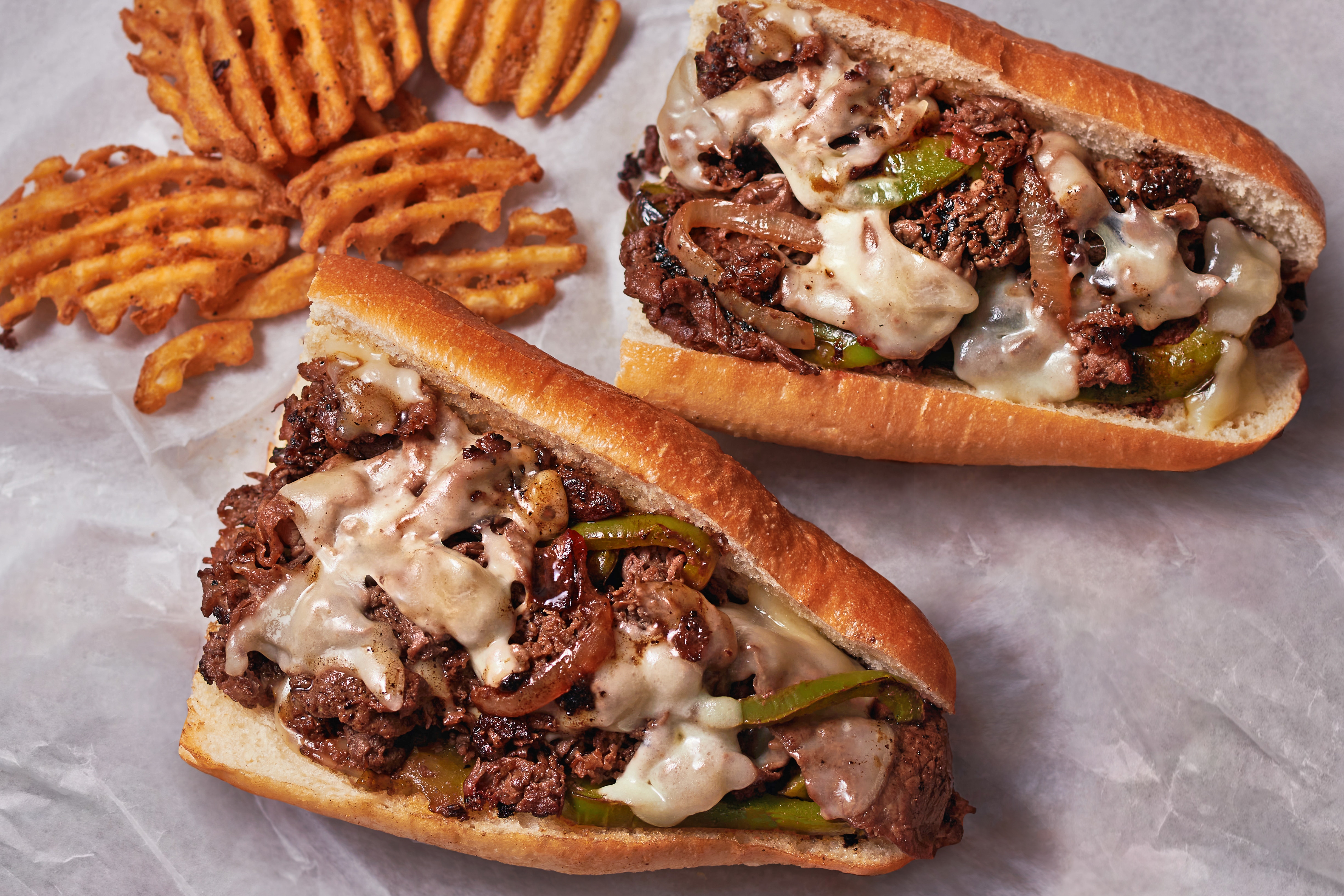 Philly Cheesesteak with Grilled Peppers and Onions – - Recipe