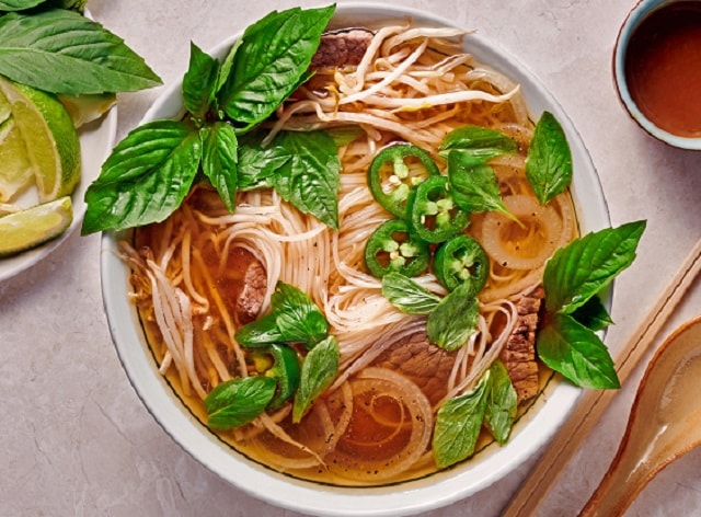 Traditional Vietnamese Pho with Tender Beef Slices Traditional Vietnamese Pho with Tender Beef Slices